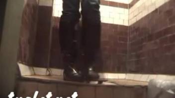 Female defecating in the bathroom captured by secret camera