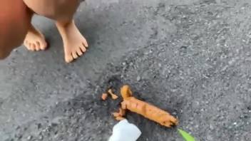 Lady defecating on a mountain road in a remote area
