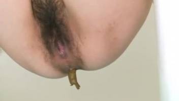 Asian scat female with bushy pussy